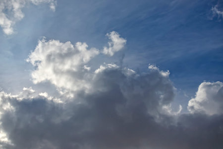White and dark clouds in the blue sky cloudscape
