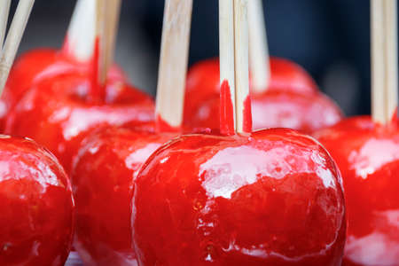 Red sugar apples on a stick. Eastern sweetsの写真素材