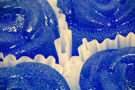 Blue candies in white wrappersの写真素材