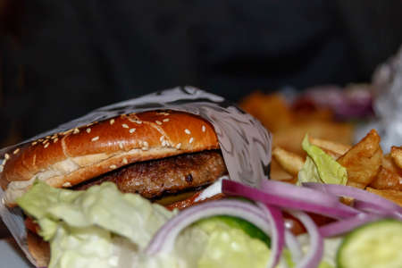 Hamburger with leek and lettuce close upの写真素材
