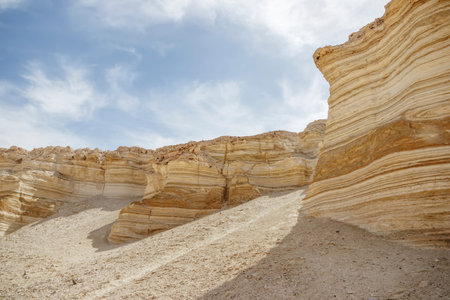Striped white chalk cliffs in the gorge on the dead sea