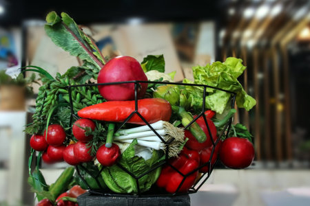 Different colorful vegetables in a basket.