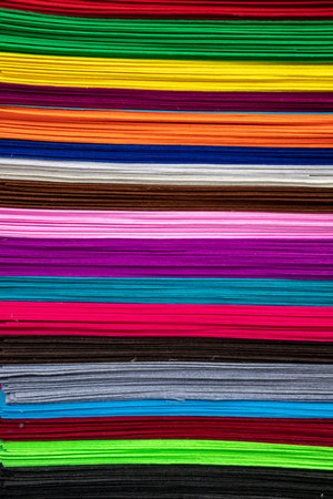 Felt fabrics of various colors in the oriental market closeup. Travel. Kyrgyzstan