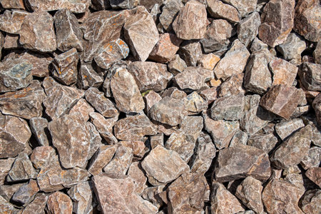 Background from fragments of granite stones close up.