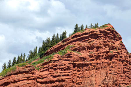 View of mountain ranges covered with coniferous forest in the Jety-Oguz gorge Kyrgyzstanの写真素材