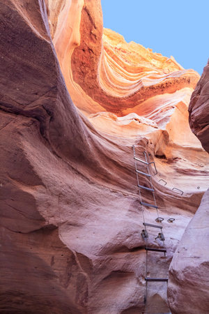 Spectacular stone mountain surfaces with stairs for climbing in the Red Slot Canyon. Travel Israelの写真素材