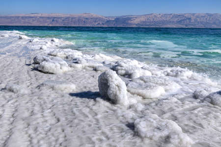 Crystal salt on a rock near beach in the Dead Sea closeup. Israelの写真素材