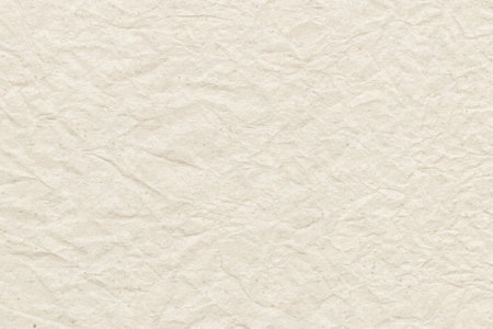 Crumpled light brown paper texture or paper background for design with copy space for text or image.の写真素材