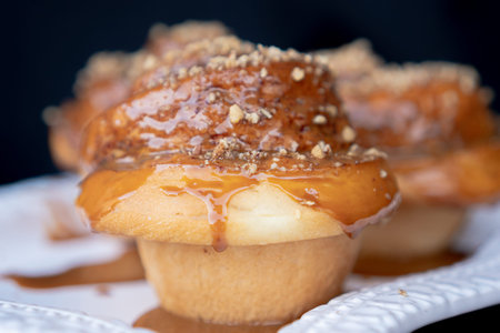 Exquisite traditional Mexican bread made with orange with sugar on top, Mexican style with a black background.の写真素材