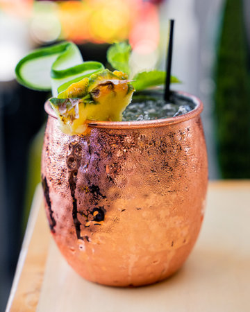 Refreshing mixology drink with mezcal and maracuya fruit, served in a Mexican restaurant bar.の写真素材