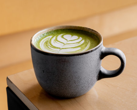delicious hot matcha on a nice cup in a brunch restaurant ambient