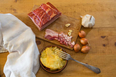 Small tartiflette, with pork belly, onions and garlicの写真素材