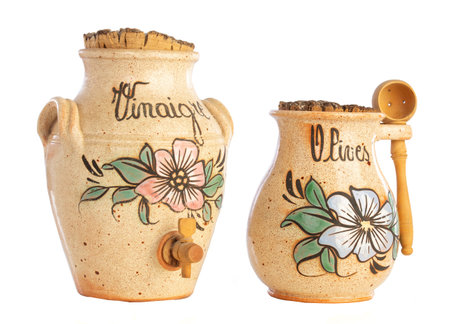 stoneware pots for vinegar and olives on a white backgroundの写真素材