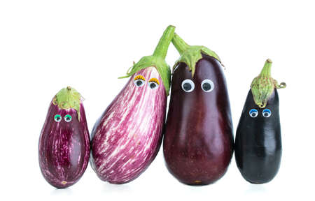 Eggplant family with eyes on a white background cut out on a white backgroundの写真素材