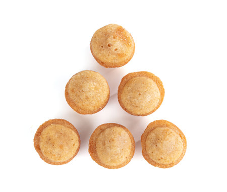 Small soft cakes to taste it on a white backgroundの写真素材