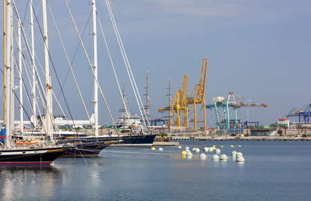A Few Docked Sailing Ships with the Seaport の写真素材