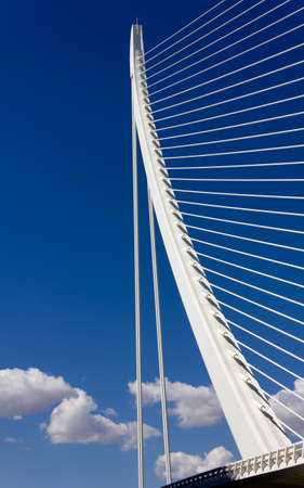 Detail of a modern bridge against a blue skyの写真素材