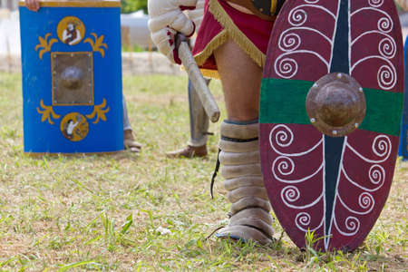 Painted battle shields carried by ancient gladiators at a historical reenactmentの写真素材