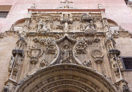 Decoration over the gothic portal of the Iglesia Capitular de El Sagrario in Malaga, Spainの写真素材