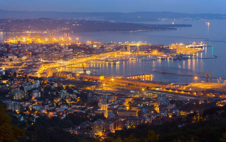 Trieste, Italy, cityscape in the late eveningの写真素材