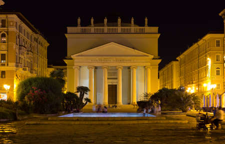 TRIESTE, Italy - August  3, 2017: Night view of Piazza Sant'Antonio Nuovo with the catholic church of Sant'Antonio Taumaturgo in Trieste, Italyのeditorial素材
