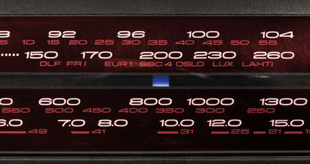Closeup on the frequency display of a radio FM-LW-MW-SW tunerの写真素材