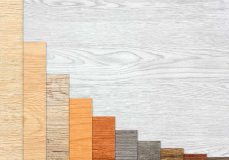 Wood textured graph bars in descending order over a white wood backgroundの写真素材