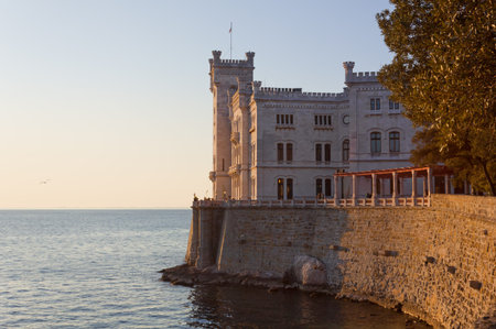 Castle of Miramare in Trieste, Italy, during a winter sunsetのeditorial素材