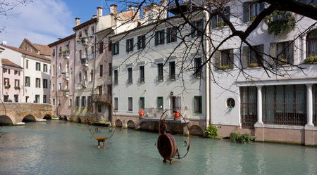 TREVISO, Italy - March 6, 2014: A few modern artworks in a canal in the old townのeditorial素材