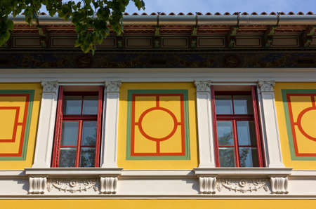 Detail of the richly decorated colorful facade of a public building inside the San Giovanni park in Trieste, Italyの写真素材