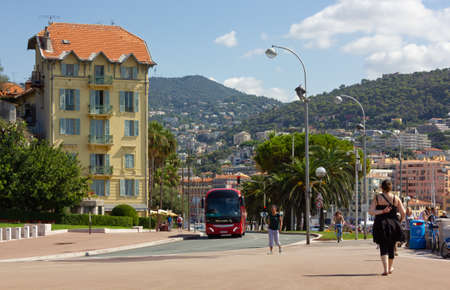 NICE, France - August 19, 2014: City life on a boulevard during a splendid summer morningのeditorial素材