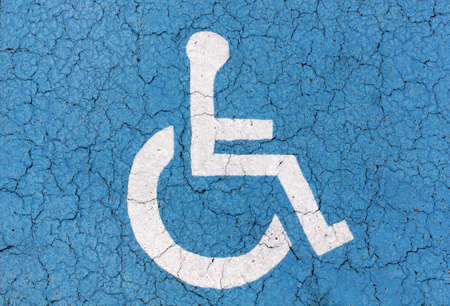 International access sign on a cracked asphaltの写真素材