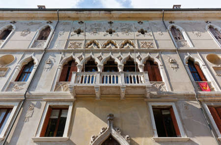 FELTRE, Italy - August 12, 2020: Facade of the neo-gothic Guarnieri palace, in Piazza Maggioreのeditorial素材