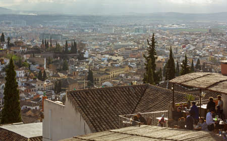 GRANADA, Spain - December 29, 2015: Winter late afternoon in Albaicin district on a panoramic point over the city of Granadaのeditorial素材