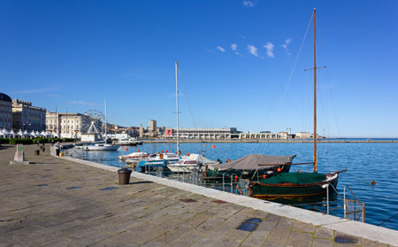 TRIESTE, Italy - May 4, 2016: Downtown seafront in the morning of a springtime working day