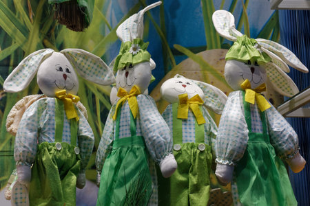 MARIBOR, Slovenia - April 10, 2022: Four rabbit puppets on display in a shop window