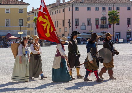 PALMANOVA, Italy - September 4, 2022: Reenactors parading through the town's main square during the Seventeenth Century annual historical reenactmentのeditorial素材