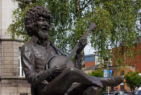 DUBLIN, Ireland - August 5 2023: Close-up of the bronze statue of Luke Kelly Dublin born singer,...