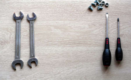 Mechanic tools with wooden background. Top view with copy spaceの写真素材