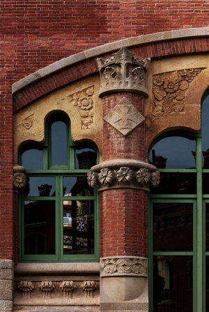 Shot in color detail on the facade of this historic building representing some character, animal or flower. Set at Eixample, Barcelona, Catalunya, Spain, Europeの写真素材