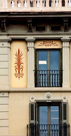 Shot in color detail on the facade of this historic building representing some character, animal or flower. Set at Eixample, Barcelona, Catalunya, Spain, Europeの写真素材