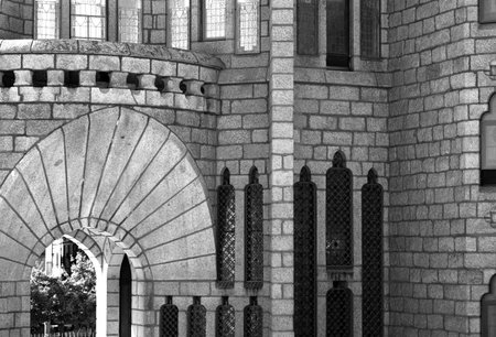 Shot in black and white detail on the facade of this historic building representing some character,...