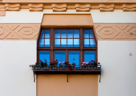 Window of old house with flower pots in Prague, Czech Republic.の写真素材