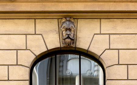 Lion head on the facade of a building in Lviv, Ukraine