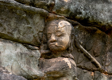 Ancient Buddha statue in Angkor Wat, Siem Reap, Cambodiaの写真素材