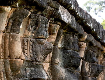 Carvings on the walls of Angkor Thom, Siem Reap, Cambodiaの写真素材