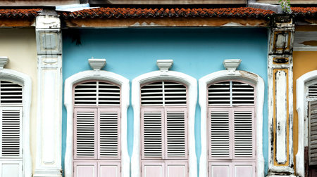 Colorful wooden windows in the old town of Phuket, Thailand