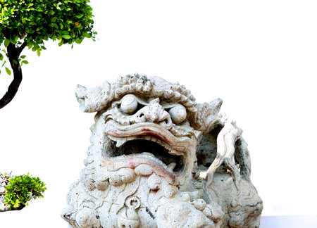 Stone lion statue in a temple. (clipping path)