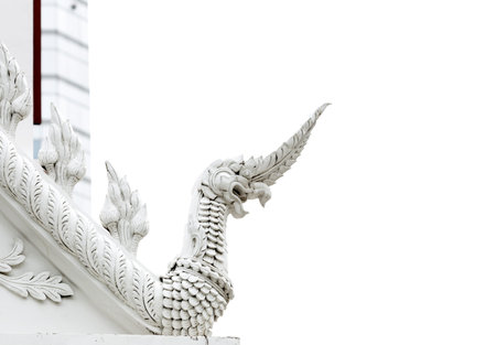 Naga statue on white background,Thai temple in Thailand.の写真素材
