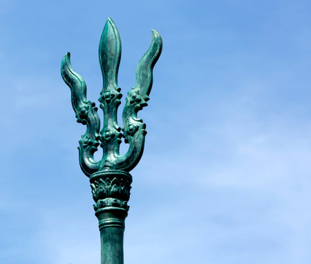 Detail of a street lamp with blue sky in the background.の写真素材